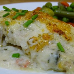 Filete de pescado en salsa con Camarones